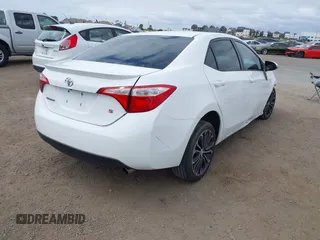 2014 Toyota Corolla L with VIN 5YFBURHE2EP085339, listed as a IAAI auction lot 42121009 with 122,339 mi miles and . Bid and sale history available at DreamBid. Image 4.