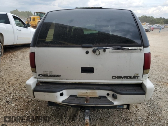 2000 Chevrolet Blazer LT z VIN 1GNDT13WXY2276000, wystawiony jako Copart lot #72736464 z przebiegiem 204 388 mil mil oraz Szkoda całkowita • Salvage title. Historia ofert i sprzedaży dostępna na DreamBid. Obrazek 6.