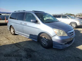 2005 Honda Odyssey EX-L with VIN 5FNRL38645B092814, listed as a Copart auction lot 50587065 with 262,912 mi miles and Salvage Title. Bid and sale history available at carsss.com. Image 4.