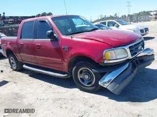 2001 Ford F-150 SuperCrew XLT with VIN 1FTRW07L11KE20412, listed as a IAAI auction lot 41877980 with NaN miles. Bid and sale history available at carsss.com. Image 1.