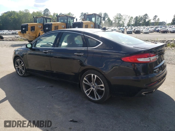 2019 Ford Fusion Titanium with VIN 3FA6P0K96KR270554, listed as a Copart auction lot 55976915 with 132,731 mi miles and Clean title. Bid and sale history available at DreamBid. Image 2.