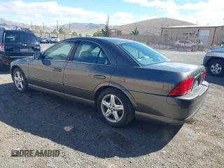 2002 Lincoln LS w/Base Pkg with VIN 1LNHM87A02Y706583, listed as a IAAI auction lot 41809363 with 131,313 mi miles. Bid and sale history available at carsss.com. Image 3.