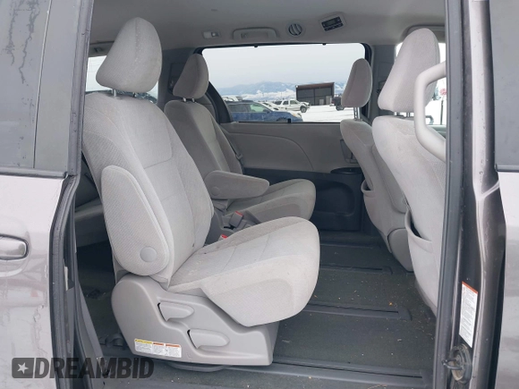2016 Toyota Sienna LE with VIN 5TDJK3DC6GS142669, listed as a IAAI auction lot 41436771 with 135,715 mi miles. Bid and sale history available at carsss.com. Image 8.
