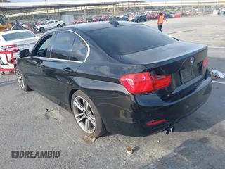 2015 BMW 3 Series 328i with VIN WBA3A5C55FP604316, listed as a IAAI auction lot 41915627 with 120,594 mi miles. Bid and sale history available at carsss.com. Image 3.