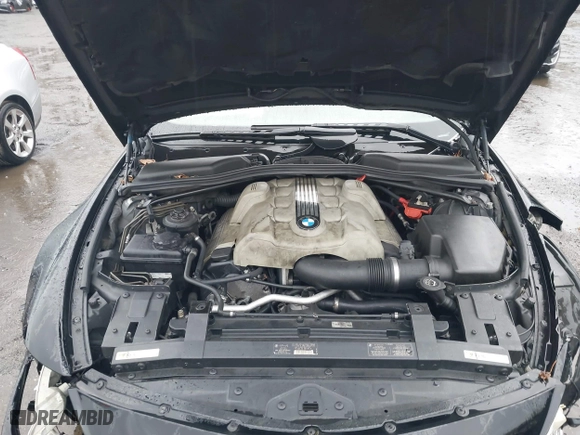2005 BMW 6 Series 645Ci with VIN WBAEH73435CF95261, listed as a IAAI auction lot 41993137 with 111,988 mi miles. Bid and sale history available at carsss.com. Image 10.