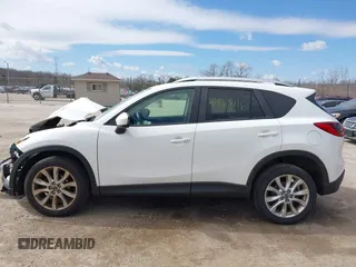2014 Mazda CX-5 Grand Touring with VIN JM3KE4DY8E0397330, listed as a IAAI auction lot 41868116 with 180,891 mi miles. Bid and sale history available at carsss.com. Image 14.