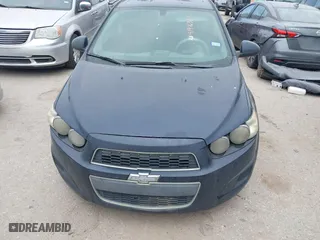 2015 Chevrolet Sonic LT with VIN 1G1JC5SH9F4127898, listed as a IAAI auction lot 41976381 with 148,658 mi miles. Bid and sale history available at carsss.com. Image 6.