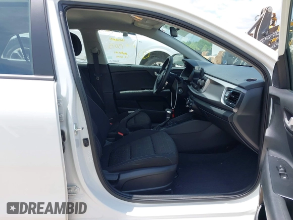 2023 Kia Rio S z VIN 3KPA24ADXPE613557, wystawiony jako IAAI lot #42198794 z przebiegiem 25 275 mil mil oraz . Historia ofert i sprzedaży dostępna na DreamBid. Obrazek 5.