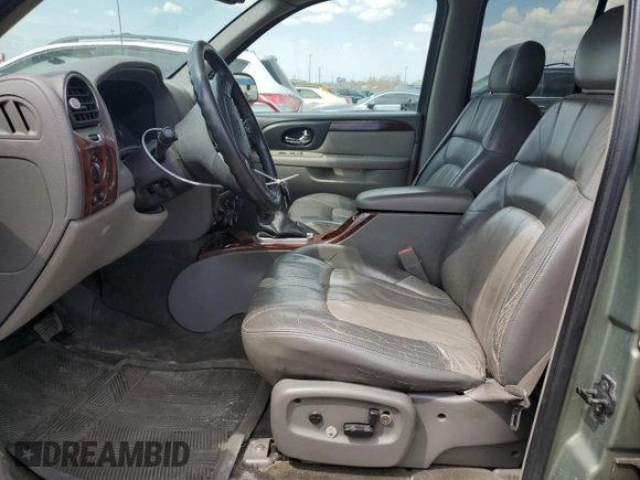 2003 GMC Envoy SLT with VIN 1GKDT13S032112192, listed as a Copart auction lot 54351985 with 297,007 mi miles and Clean Title. Bid and sale history available at carsss.com. Image 7.