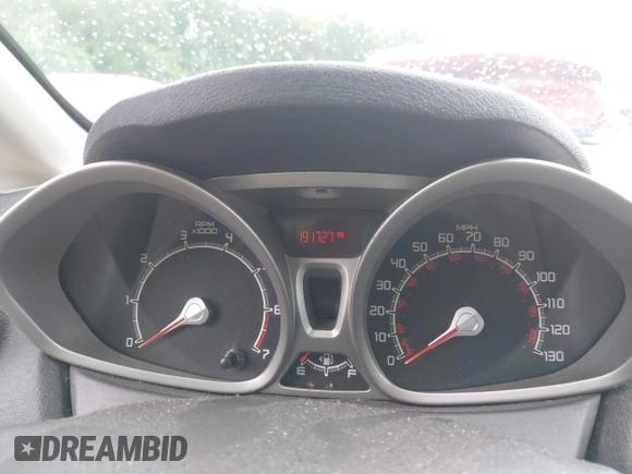 2012 Ford Fiesta SE z VIN 3FADP4BJ2CM110873, wystawiony jako IAAI lot #42347413 z przebiegiem 191 727 mil mil oraz . Historia ofert i sprzedaży dostępna na DreamBid. Obrazek 7.