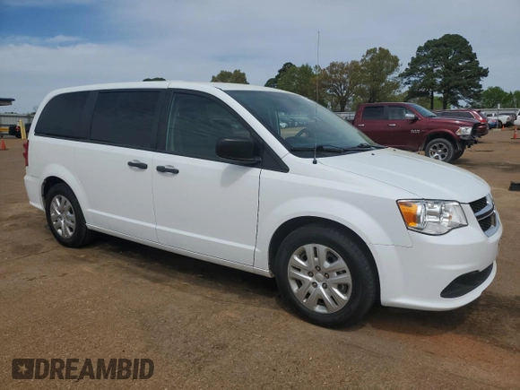 2020 Dodge Grand Caravan SE with VIN 2C4RDGBG3LR222072, listed as a Copart auction lot 50966545 with 128,241 mi miles and Salvage Title. Bid and sale history available at DreamBid. Image 4.
