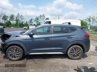 2019 Hyundai Tucson Sport z VIN KM8J33AL3KU937888, wystawiony jako IAAI lot #42310448 z przebiegiem 99 501 mil mil oraz . Historia ofert i sprzedaży dostępna na DreamBid. Obrazek 15.