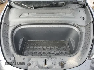 2024 Tesla Model Y Long Range with VIN 7SAYGAEE7RF043096, listed as a Copart auction lot 46939395 with 12,521 mi miles and Salvage Title. Bid and sale history available at DreamBid. Image 11.
