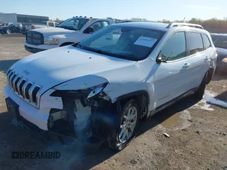 2015 Jeep Cherokee Latitude with VIN 1C4PJLCBXFW506502, listed as a IAAI auction lot 42103117 with 160,433 mi miles and . Bid and sale history available at carsss.com. Image 2.