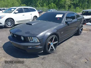 2007 Ford Mustang GT Deluxe with VIN 1ZVFT82H575237242, listed as a IAAI auction lot 42011930 with 223,858 mi miles. Bid and sale history available at carsss.com. Image 2.
