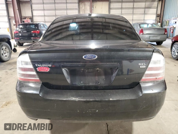 2009 Ford Taurus SEL with VIN 1FAHP27W99G102850, listed as a Copart auction lot 50009975 with 184,829 mi miles and Salvage Title. Bid and sale history available at carsss.com. Image 6.