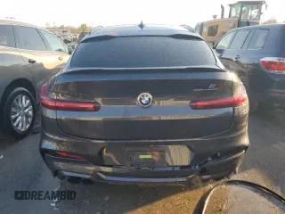 2020 BMW X4 M Competition z VIN 5YMUJ0C07L9C62294, wystawiony jako Copart lot #77492114 z przebiegiem 51 385 mil mil oraz Szkoda całkowita • Salvage title. Historia ofert i sprzedaży dostępna na DreamBid. Obrazek 6.
