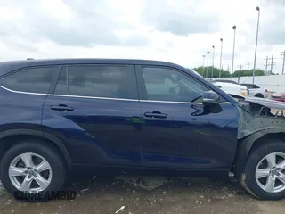 2023 Toyota Highlander L with VIN 5TDKDRAH4PS024895, listed as a IAAI auction lot 42390330 with 177,607 mi miles and . Bid and sale history available at DreamBid. Image 14.