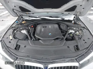 2018 BMW 7 Series 740i xDrive with VIN WBA7E4C59JGV23876, listed as a IAAI auction lot 41381398 with 106,675 mi miles. Bid and sale history available at carsss.com. Image 10.