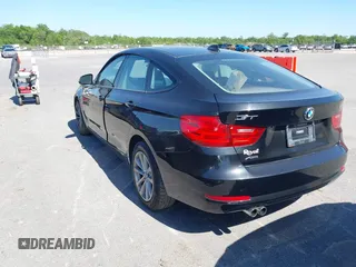 2014 BMW 3 Series GT 328i xDrive with VIN WBA3X5C51ED557347, listed as a IAAI auction lot 42028680 with 178,469 mi miles. Bid and sale history available at carsss.com. Image 3.