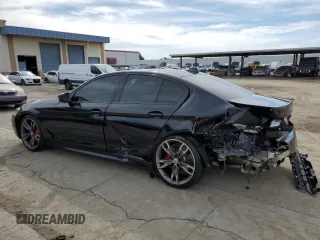 2023 BMW 5 Series M550i xDrive with VIN WBA13BK0XPCM98878, listed as a Copart auction lot 45580685 with 10,866 mi miles and Salvage title. Bid and sale history available at DreamBid. Image 2.