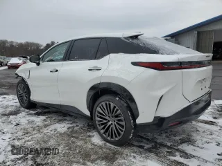 2024 Lexus RZ 450e Premium z VIN JTJAAAABXRA025712, wystawiony jako Copart lot #86183394 z przebiegiem 3 799 mil mil oraz Szkoda całkowita • Salvage title. Historia ofert i sprzedaży dostępna na DreamBid. Obrazek 2.