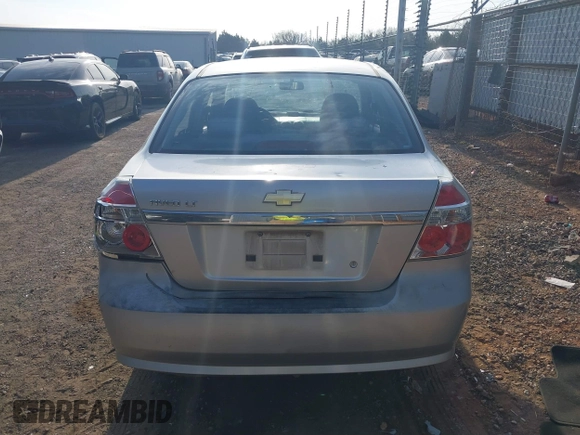 2009 Chevrolet Aveo 1LT z VIN KL1TD56E49B372791, wystawiony jako IAAI lot #41890124 z przebiegiem 118 648 mil mil oraz . Historia ofert i sprzedaży dostępna na DreamBid. Obrazek 16.