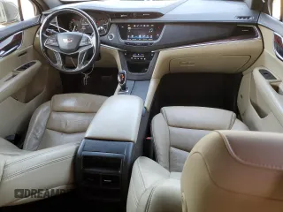 2019 Cadillac XT5 Luxury FWD z VIN 1GYKNCRS4KZ221304, wystawiony jako Copart lot #54995415 z przebiegiem 128 940 mil mil oraz Szkoda całkowita • Salvage title. Historia ofert i sprzedaży dostępna na DreamBid. Obrazek 8.