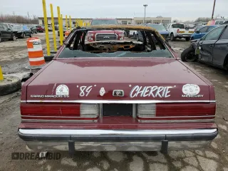1989 Mercury Grand Marquis GS z VIN 2MEBM74F2KX698022, wystawiony jako Copart lot #44941735 z przebiegiem Nie podano mil oraz Nie do naprawy. Historia ofert i sprzedaży dostępna na DreamBid. Obrazek 12.