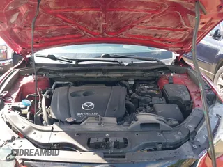 2015 Mazda CX-5 Sport with VIN JM3KE2BE8F0451014, listed as a IAAI auction lot 42536333 with 131,059 mi miles and . Bid and sale history available at DreamBid. Image 10.