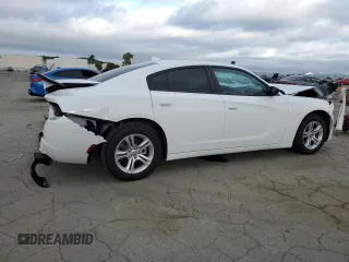 2023 Dodge Charger SXT with VIN 2C3CDXBG5PH703978, listed as a Copart auction lot 50657745 with 7,198 mi miles and Salvage Title. Bid and sale history available at carsss.com. Image 3.