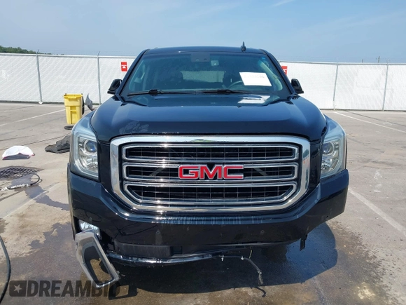 2016 GMC Yukon XL SLE with VIN 1GKS1FKC9GR161876, listed as a IAAI auction lot 39948106 with 60,800 mi miles. Bid and sale history available at carsss.com. Image 12.