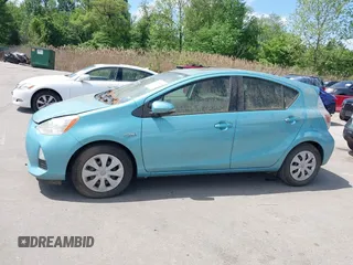 2014 Toyota Prius One with VIN JTDKDTB30E1077183, listed as a IAAI auction lot 42183675 with 92,560 mi miles and . Bid and sale history available at DreamBid. Image 14.
