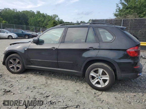 2012 BMW X5 35i with VIN 5UXZV4C5XCL761370, listed as a Copart auction lot 59436845 with 124,722 mi miles and Salvage title. Bid and sale history available at DreamBid. Image 2.