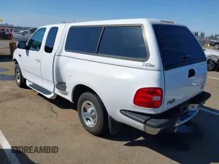 1998 Ford F-150 XL with VIN 1FTZX072XWKA12003, listed as a IAAI auction lot 41765328 with 119,445 mi miles and . Bid and sale history available at DreamBid. Image 3.
