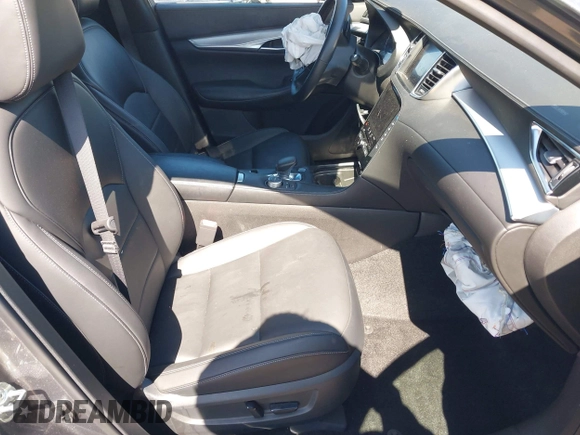 2021 Infiniti QX50 Luxe z VIN 3PCAJ5BA2MF111323, wystawiony jako IAAI lot #42218711 z przebiegiem 27 864 mil mil oraz . Historia ofert i sprzedaży dostępna na DreamBid. Obrazek 5.