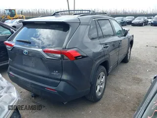 2021 Toyota RAV4 Hybrid LE with VIN 2T3LWRFVXMW118867, listed as a IAAI auction lot 41879735 with 62,978 mi miles. Bid and sale history available at carsss.com. Image 4.