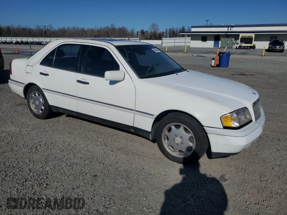 1996 Mercedes-Benz C with VIN WDBHA28E8TF389546, listed as a Copart auction lot 86340144 with 314,364 mi miles and Salvage Title. Bid and sale history available at carsss.com. Image 4.