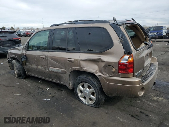 2002 GMC Envoy SLT with VIN 1GKDT13SX22353269, listed as a Copart auction lot 45421375 with 212,027 mi miles and Salvage Title. Bid and sale history available at carsss.com. Image 2.