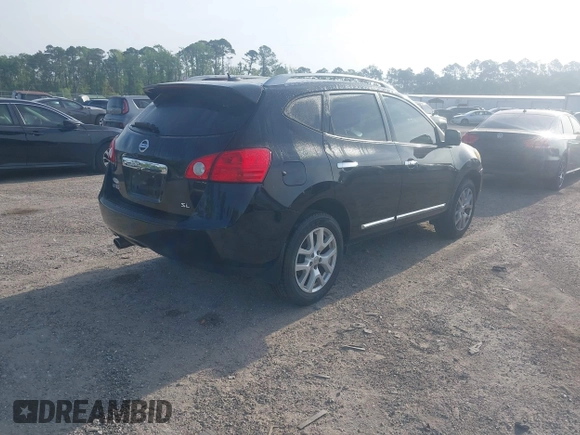 2013 Nissan Rogue S with VIN JN8AS5MT1DW529724, listed as a IAAI auction lot 42107702 with 101,813 mi miles and . Bid and sale history available at DreamBid. Image 4.