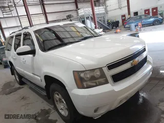 2009 Chevrolet Suburban LT w/1LT with VIN 1GNFK26309R170215, listed as a IAAI auction lot 41356209 with 212,361 mi miles. Bid and sale history available at carsss.com. Image 1.