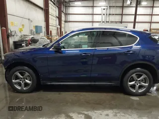 2018 Alfa Romeo Stelvio z VIN ZASFAKAN6J7B74782, wystawiony jako IAAI lot #41939007 z przebiegiem 48 210 mil mil oraz . Historia ofert i sprzedaży dostępna na DreamBid. Obrazek 15.