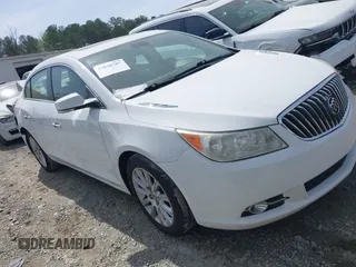 2013 Buick LaCrosse Premium 1 z VIN 1G4GF5E32DF268639, wystawiony jako IAAI lot #41934122 z przebiegiem 176 276 mil mil oraz . Historia ofert i sprzedaży dostępna na DreamBid. Obrazek 13.