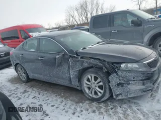 2013 Kia Optima EX with VIN 5XXGN4A72DG143975, listed as a IAAI auction lot 41385803 with 216,203 mi miles. Bid and sale history available at carsss.com. Image 13.