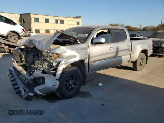 2022 Toyota Tacoma SR5 with VIN 3TMDZ5BN4NM121793, listed as a Copart auction lot 82399364 with 63,354 mi miles and Salvage title. Bid and sale history available at DreamBid. Image 1.