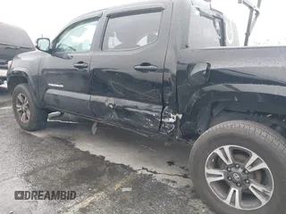 2017 Toyota Tacoma SR5 with VIN 5TFAZ5CN0HX053573, listed as a IAAI auction lot 41797867 with 102,628 mi miles and . Bid and sale history available at DreamBid. Image 6.