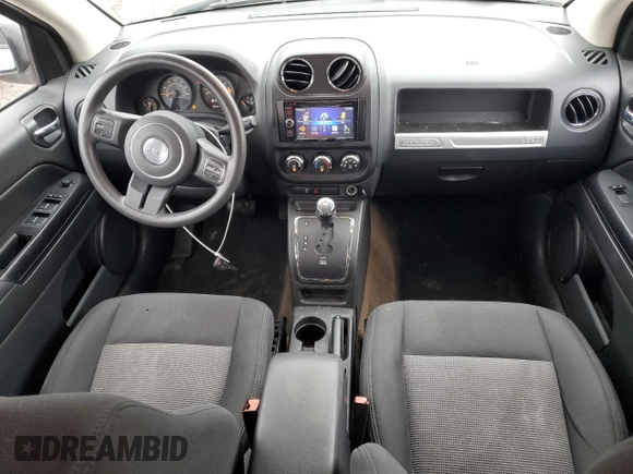 2014 Jeep Compass Sport with VIN 1C4NJDBB9ED641754, listed as a Copart auction lot 52806165 with 76,100 mi miles and Clean Title. Bid and sale history available at carsss.com. Image 8.