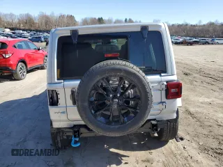 2024 Jeep Wrangler Sahara with VIN 1C4RJXP63RW195206, listed as a Copart auction lot 48784595 with 10,737 mi miles and Salvage Title. Bid and sale history available at DreamBid. Image 6.