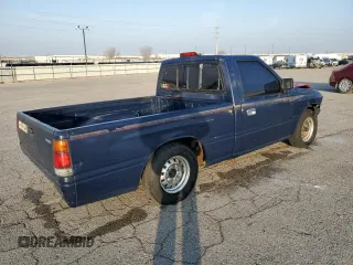 1995 Isuzu Pickup S z VIN JAACL11L1S7210899, wystawiony jako Copart lot #83460954 z przebiegiem 192 099 mil mil oraz Szkody całkowita. Historia ofert i sprzedaży dostępna na DreamBid. Obrazek 3.