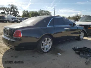 2012 Rolls-Royce Ghost z VIN SCA664S57CUX50671, wystawiony jako Copart lot #84172874 z przebiegiem Nie podano mil oraz Szkody całkowita. Historia ofert i sprzedaży dostępna na DreamBid. Obrazek 3.
